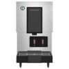 Front view of a stainless steel Hoshizaki commercial water and ice dispenser with digital display panels and drip tray.