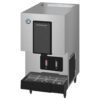 A stainless steel Hoshizaki ice and water dispenser with a black drip tray and two labeled dispensing buttons.
