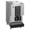 A stainless steel Hoshizaki ice and water dispenser with control buttons and a drip tray at the bottom.