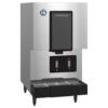 Stainless steel Hoshizaki ice and water dispenser with digital controls and a drip tray at the base.