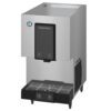 A stainless steel Hoshizaki commercial ice dispenser with a black front panel and an integrated drip tray at the base.