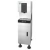 A stainless steel commercial ice and water dispenser with a touchscreen panel and two dispensing slots, standing on four black legs.
