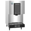 Stainless steel Hoshizaki commercial ice dispenser with a black front panel, drip tray, and control buttons, standing on four legs.