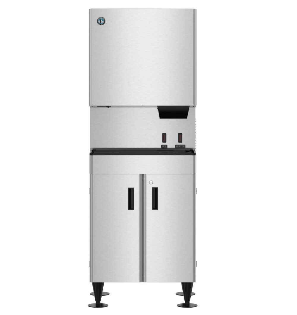 A commercial stainless steel ice maker machine with a dispenser, standing on four legs with a storage cabinet below.