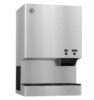 A stainless steel ice and water dispenser with two push buttons labeled "ICE" and "WATER" on the front panel.