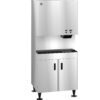 A commercial stainless steel ice and water dispenser with an upper dispensing unit and lower storage cabinet, standing on adjustable legs.