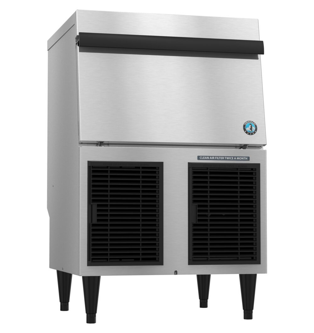 Commercial stainless steel ice maker machine with front air vents, elevated on black legs, and a closed top compartment.