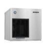 A stainless steel Hoshizaki ice machine with a black vent and a label that reads "Clean air filter twice a month.