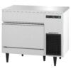 Stainless steel commercial undercounter ice maker with digital display, vent, and two pull-out drawers, standing on four black legs.