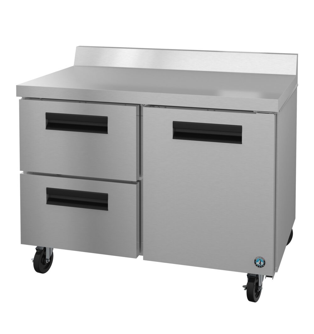 A commercial stainless steel refrigeration unit with two drawers on the left, a single door on the right, a backsplash, and wheels for mobility.