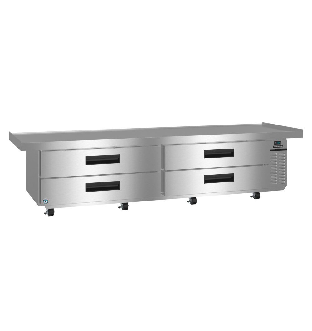 Stainless steel commercial refrigerated worktop with four drawers, mounted on wheels, and digital control panel on the right side.