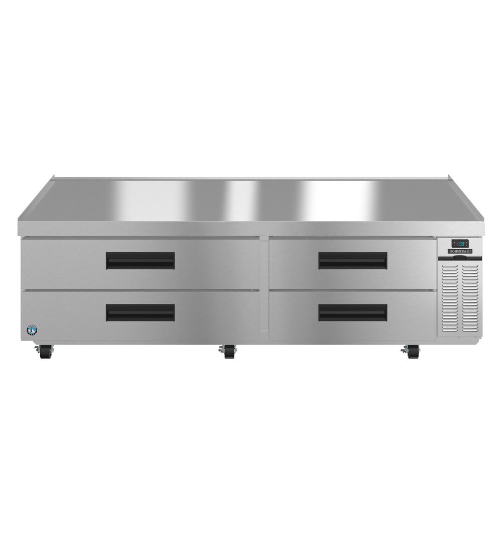 Stainless steel commercial refrigeration unit with four pull-out drawers on wheels and a digital temperature display on the right.