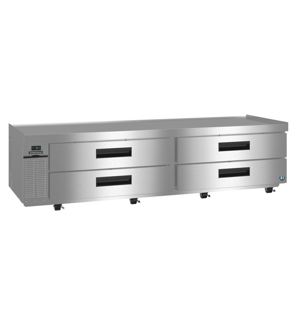 Stainless steel commercial refrigerated chef base with four drawers and digital temperature display, on caster wheels.