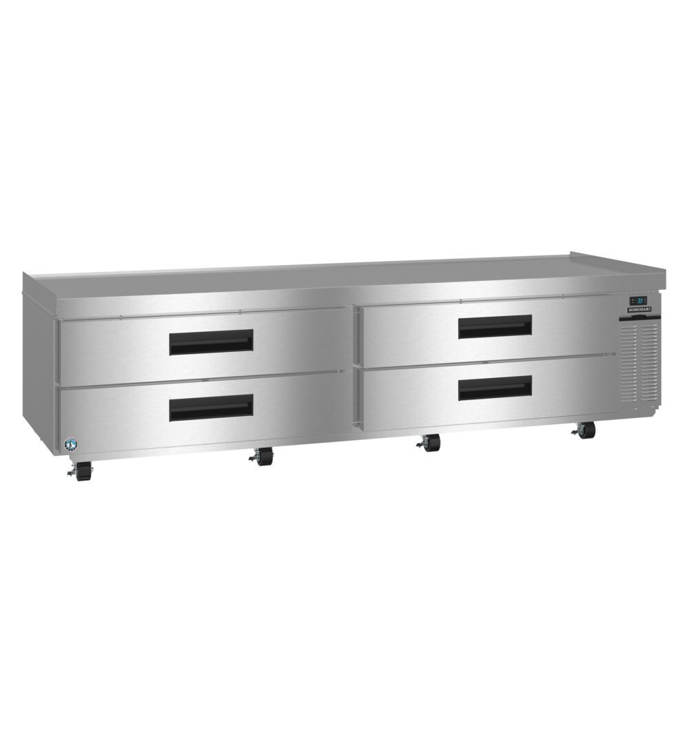 A large stainless steel commercial refrigerator with four pull-out drawers and wheels, designed for kitchen or restaurant use.