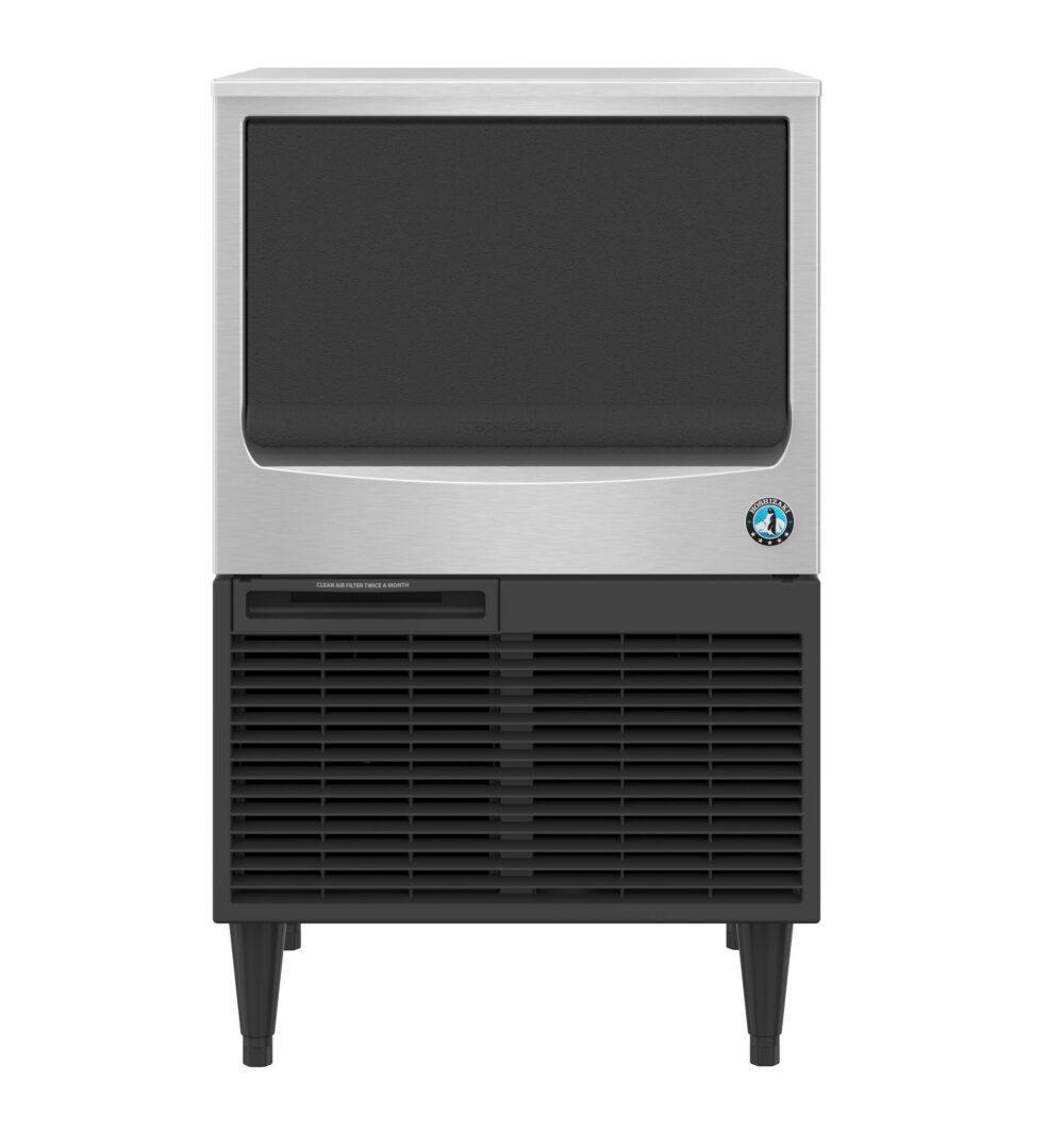 Commercial ice machine with a stainless steel and black front panel, vented bottom section, and four legs, viewed from the front.