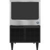 A freestanding commercial ice maker with a stainless steel front panel, black lower ventilation grille, and four short legs.