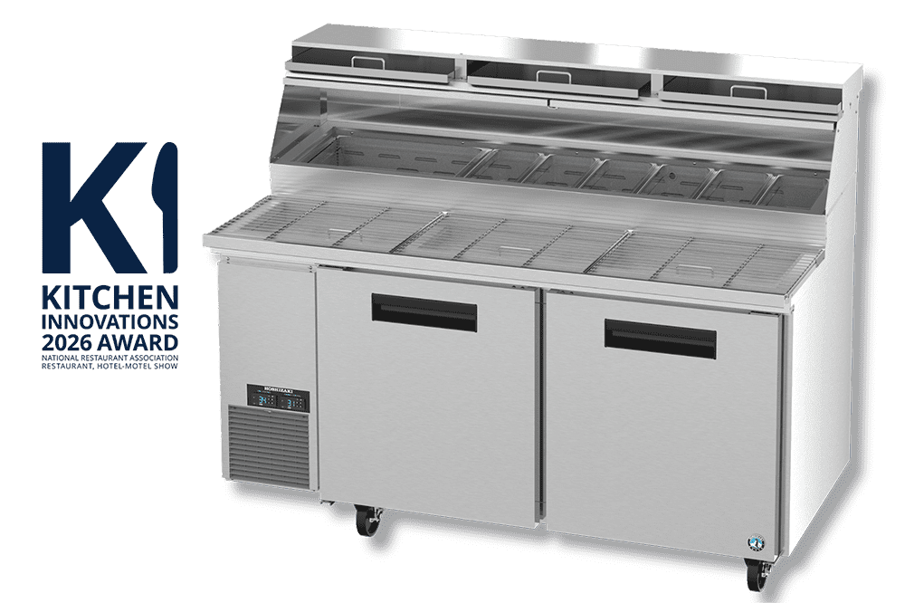 A commercial refrigerated prep table with storage compartments and a "Kitchen Innovations 2026 Award" logo on the left side.