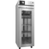 A stainless steel commercial refrigerator with a glass door, adjustable shelves, a digital temperature display, and caster wheels.