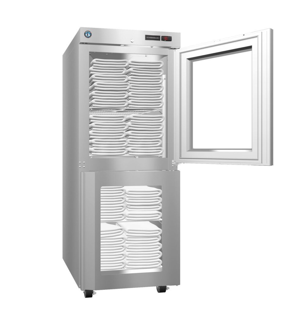 A stainless steel storage cabinet with two doors, open to reveal neatly stacked white towels on multiple shelves inside.