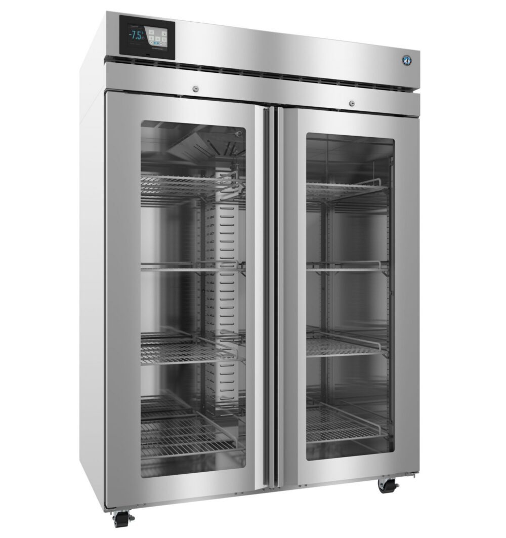 Commercial stainless steel double-door refrigerator with glass doors, digital temperature display, and multiple wire shelves visible inside.