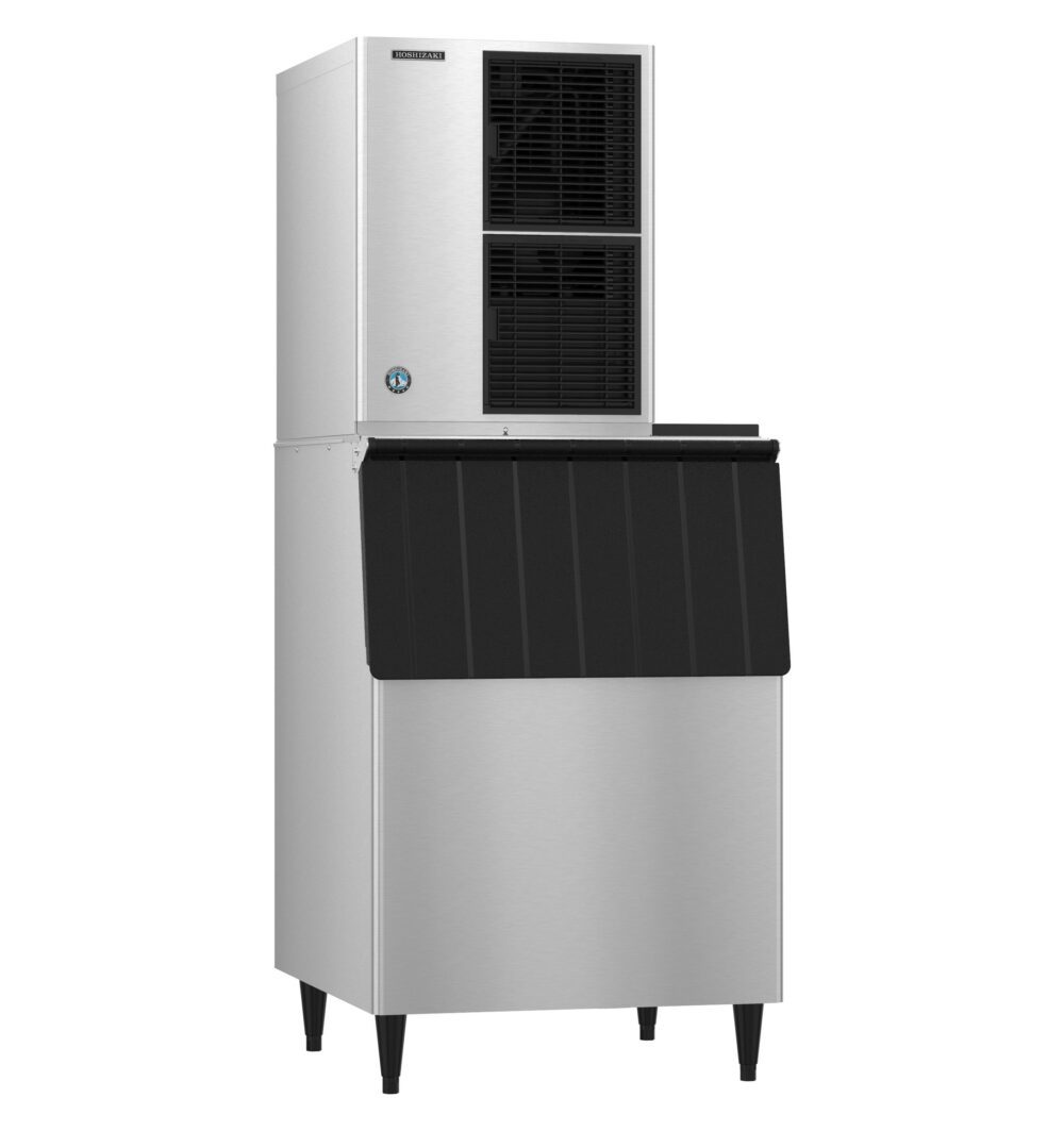 Commercial stainless steel ice maker with black front panel and elevated unit, standing on four legs.