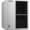 A stainless steel Hoshizaki commercial ice machine with two black ventilation grilles on the front.