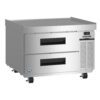 A stainless steel commercial refrigerator with two pull-out drawers, control panel, ventilation slots, and casters for mobility.