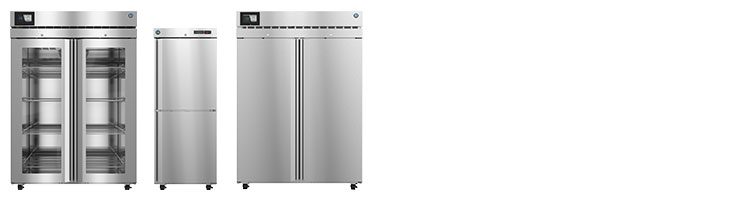 Three commercial stainless steel refrigerators are shown side by side, each with wheels and digital displays; one has glass doors and shelves visible inside.