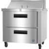 A stainless steel commercial kitchen refrigeration unit with two pull-out drawers, a lid on top, and wheels for mobility.