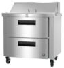 A stainless steel commercial kitchen refrigeration unit with two pull-out drawers, a lid on top, and wheels for mobility.