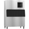 Commercial stainless steel ice machine with a black front panel and four legs, featuring a cooling vent and control panel on the upper right side.