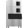 Commercial stainless steel ice machine with two stacked cooling units on top and a black ice storage bin at the bottom, standing on four legs.