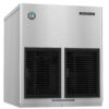 Stainless steel Hoshizaki ice machine with two black front vents and a label reading “Clean air filter twice a month.”.