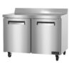A stainless steel commercial refrigerator with two doors, a backsplash, and casters for mobility, against a white background.