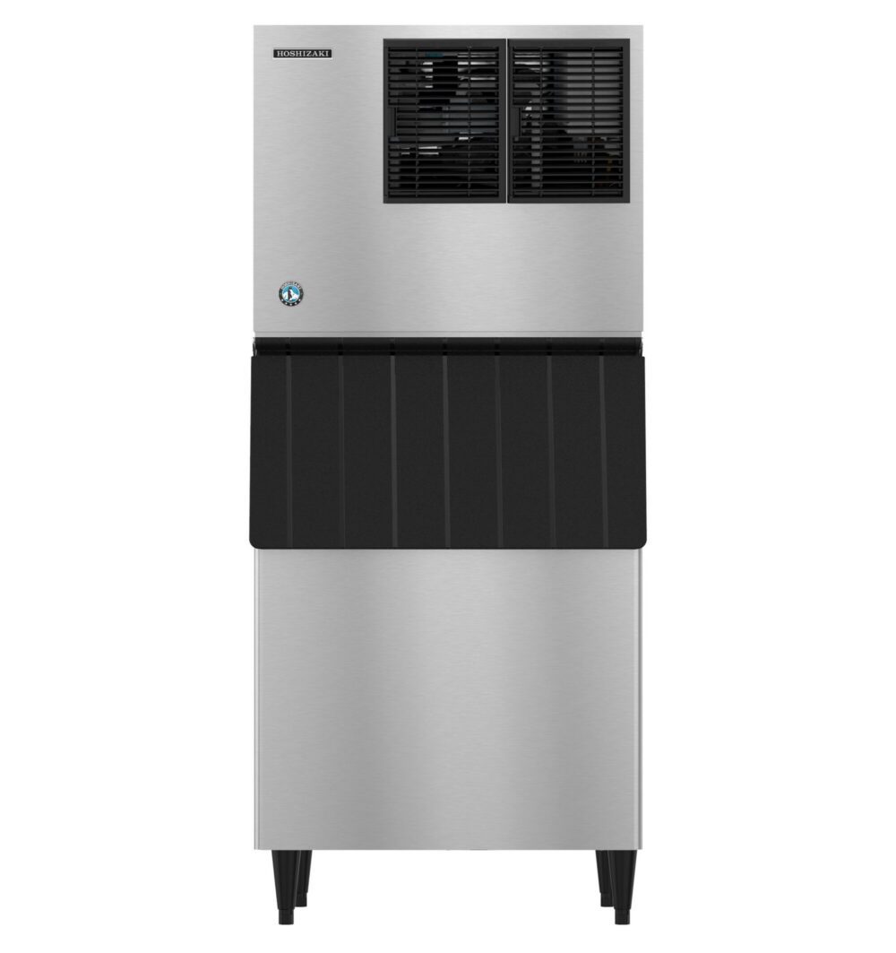 A commercial stainless steel ice maker machine with a black panel and vented section at the top, standing on four legs.