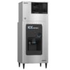 Stainless steel ice dispenser machine with a black dispensing area, labeled "ICE DISPENSER," standing on four legs.
