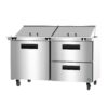 Stainless steel commercial food prep table with four compartments, two doors, two drawers, and wheels for mobility.